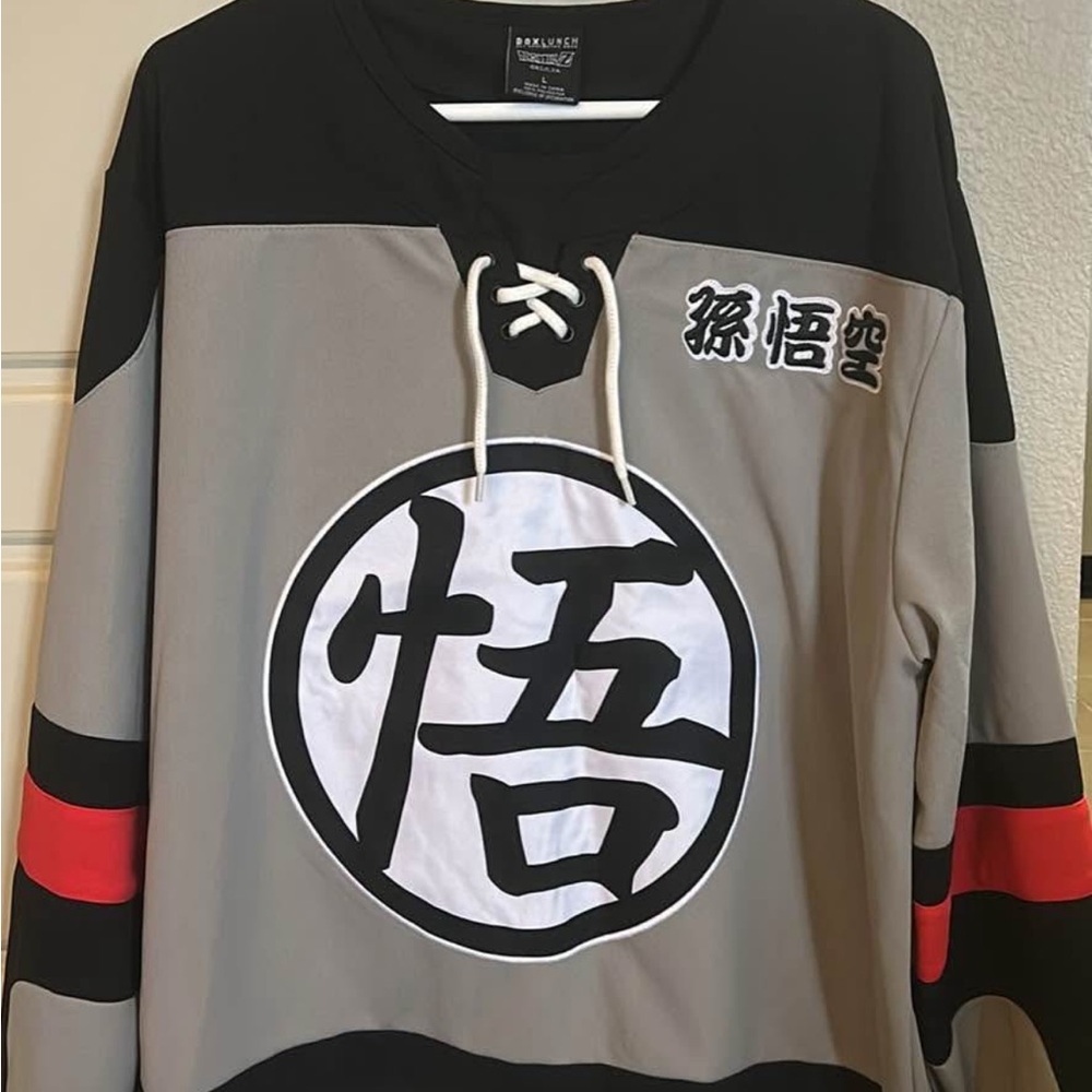 Black and Gray Hockey Jersey with Red Accents